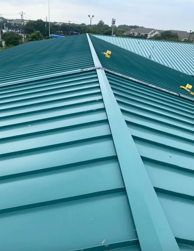 Green commercial metal roof ridge and valley for Metal Roof Repair in Stewartville